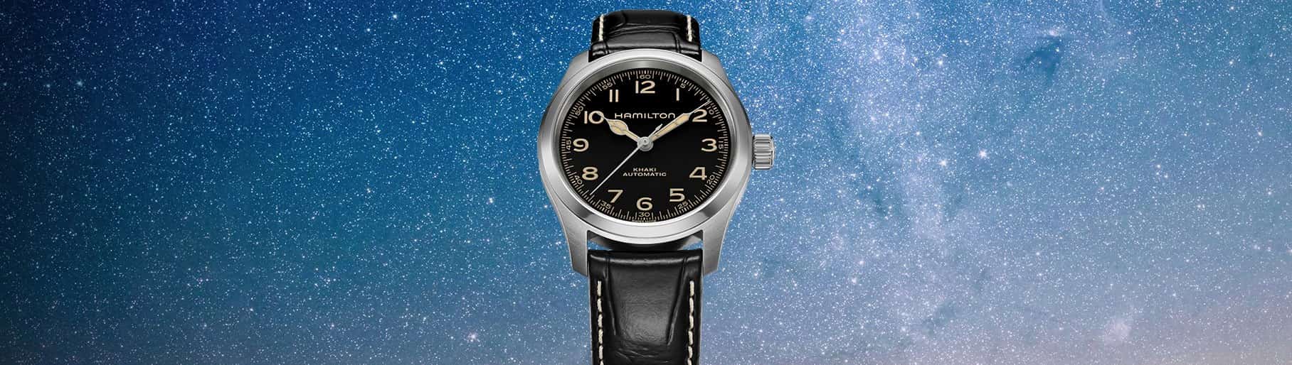 imagen de dos reloj plata con negro. HAMILTON
