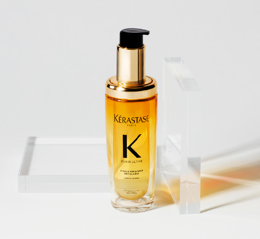 imagen de botella de tratamiento capilar color ambar de la marca KERASTASE