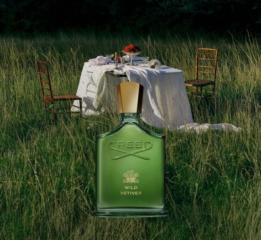 imagen de botella de perfume verde de la marca CREED WILD VETIVER