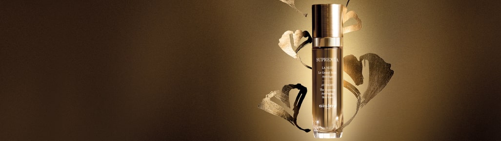 frasco de color dorado de tratamiento de la marca SISLEY