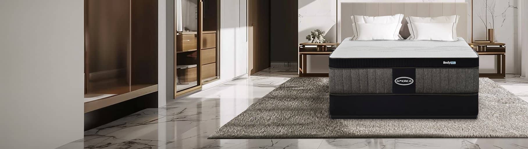 imagen de una habitacion en la cual se encuentra un na base de cama color negra con un colchon blanco con negro de la marca AMÉRICA