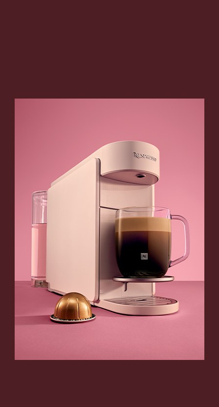 Imagen de una cafetera color blanca de la marca NESPRESSO